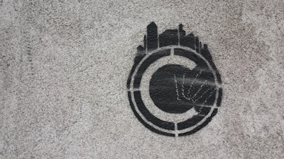 Close-up of a copyright symbol stamped on a photograph.