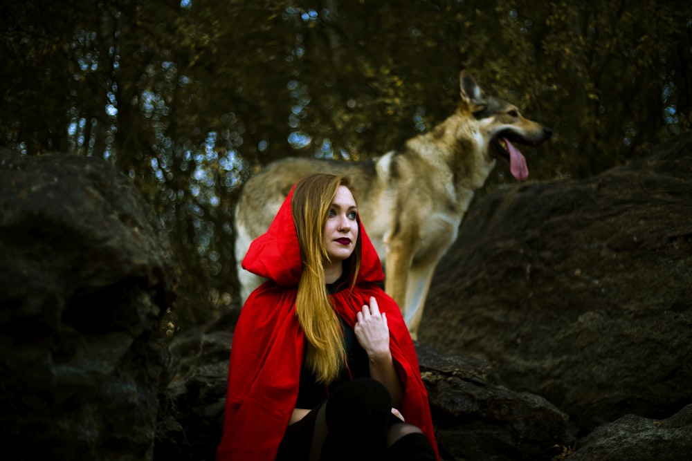 woman wearing red cape
