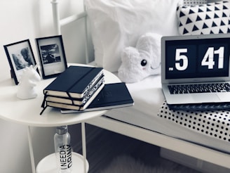books on round white table