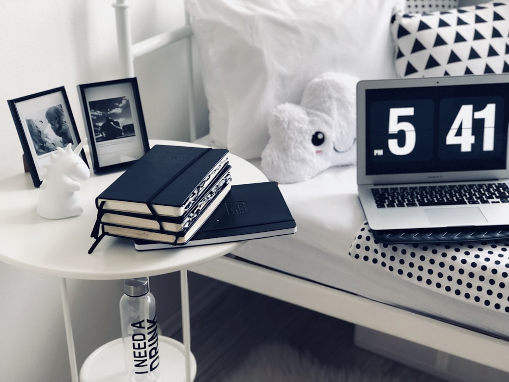 books on round white table