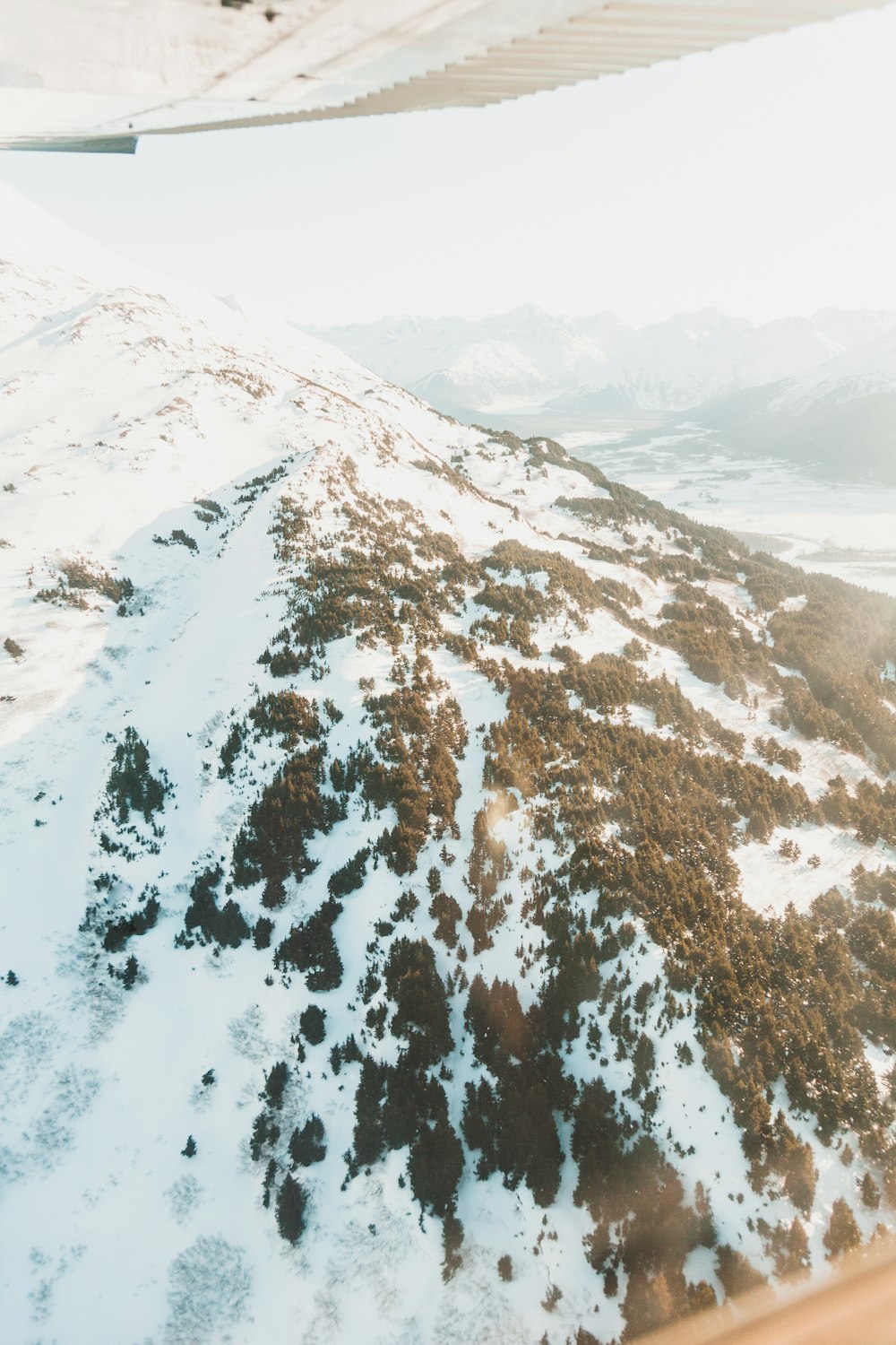 aerial photo of mountain covered with snow