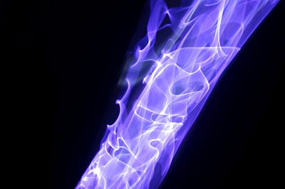 An abstract representation of sound waves in electric blue and deep purple.