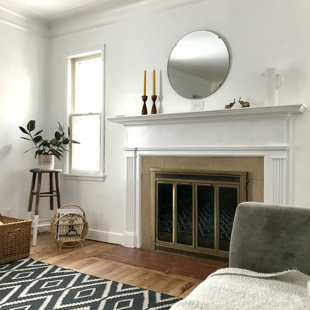 room with white wall and wooden floor