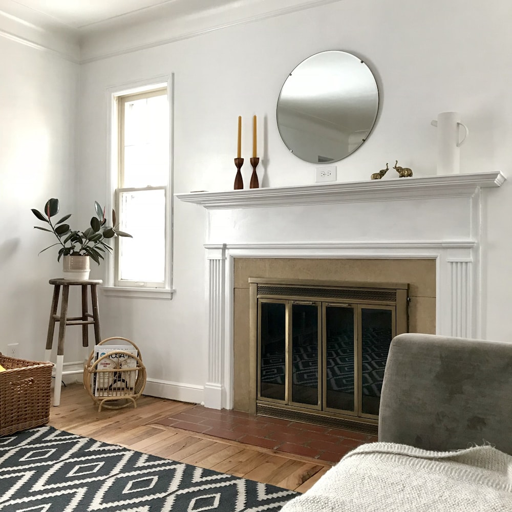 room with white wall and wooden floor