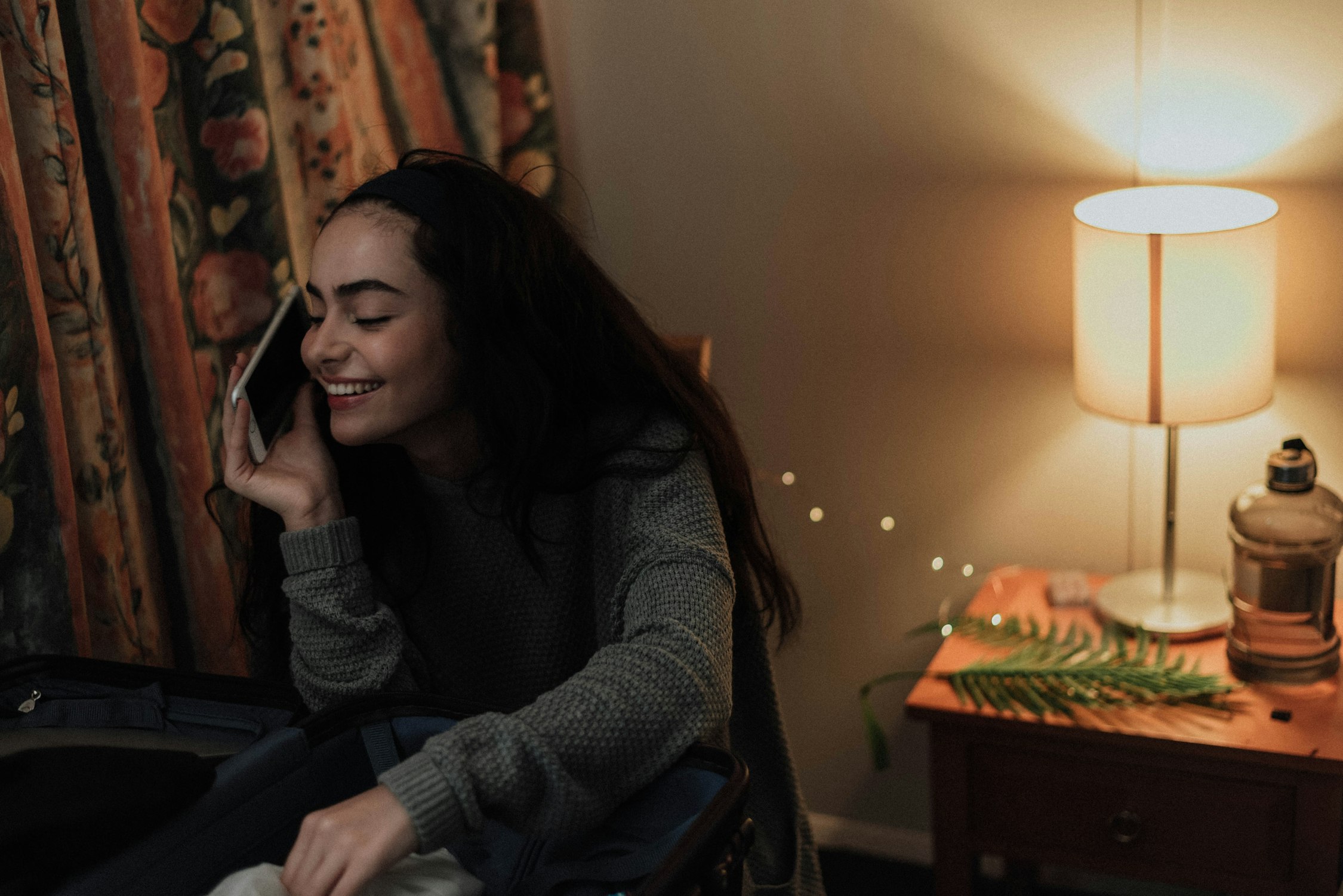 woman interacting with smartphone