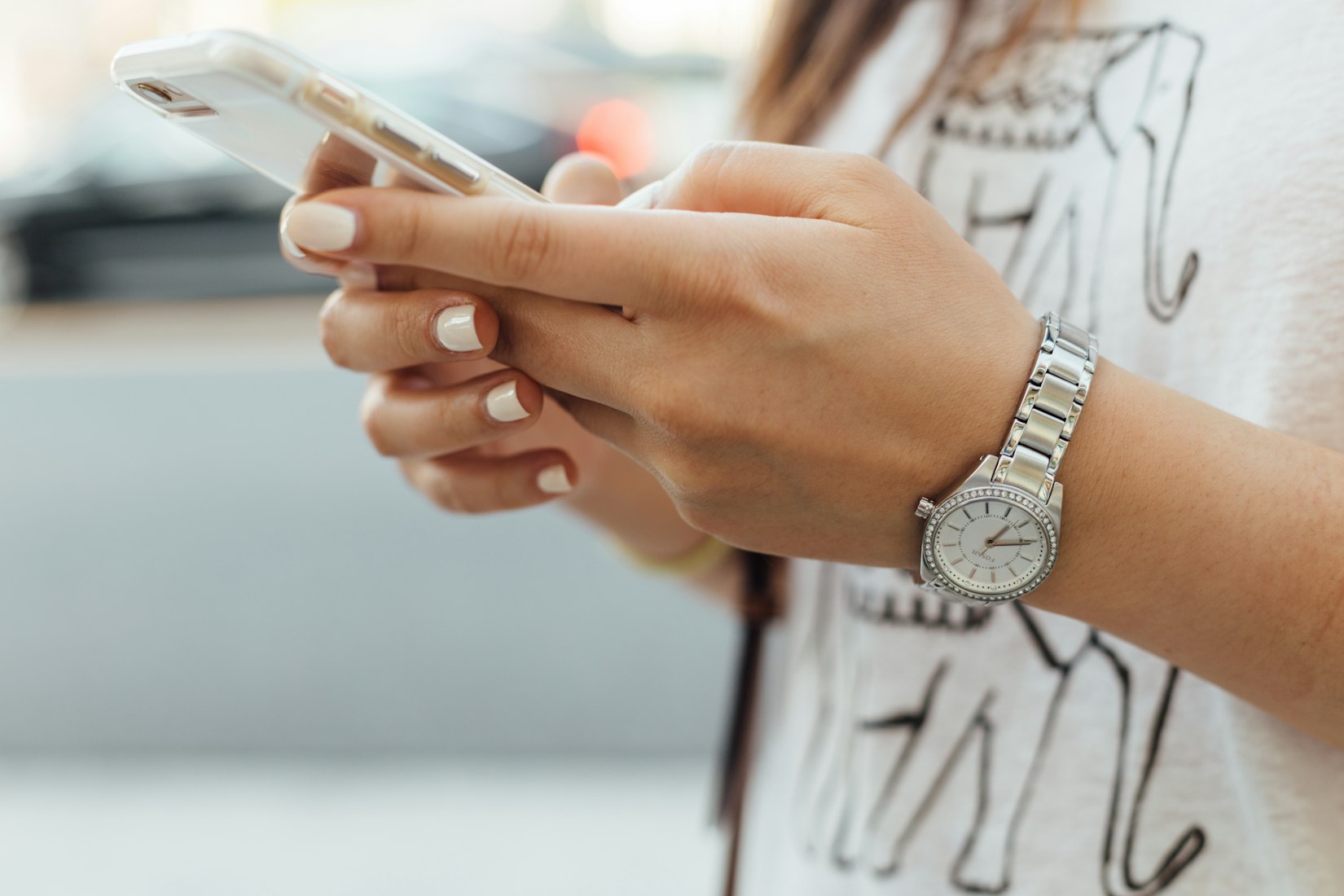 Woman Holding iPhone Close-up