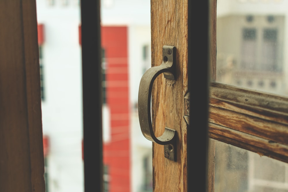 shallow focus photography of door handle