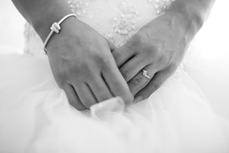 bride and groom holding hands