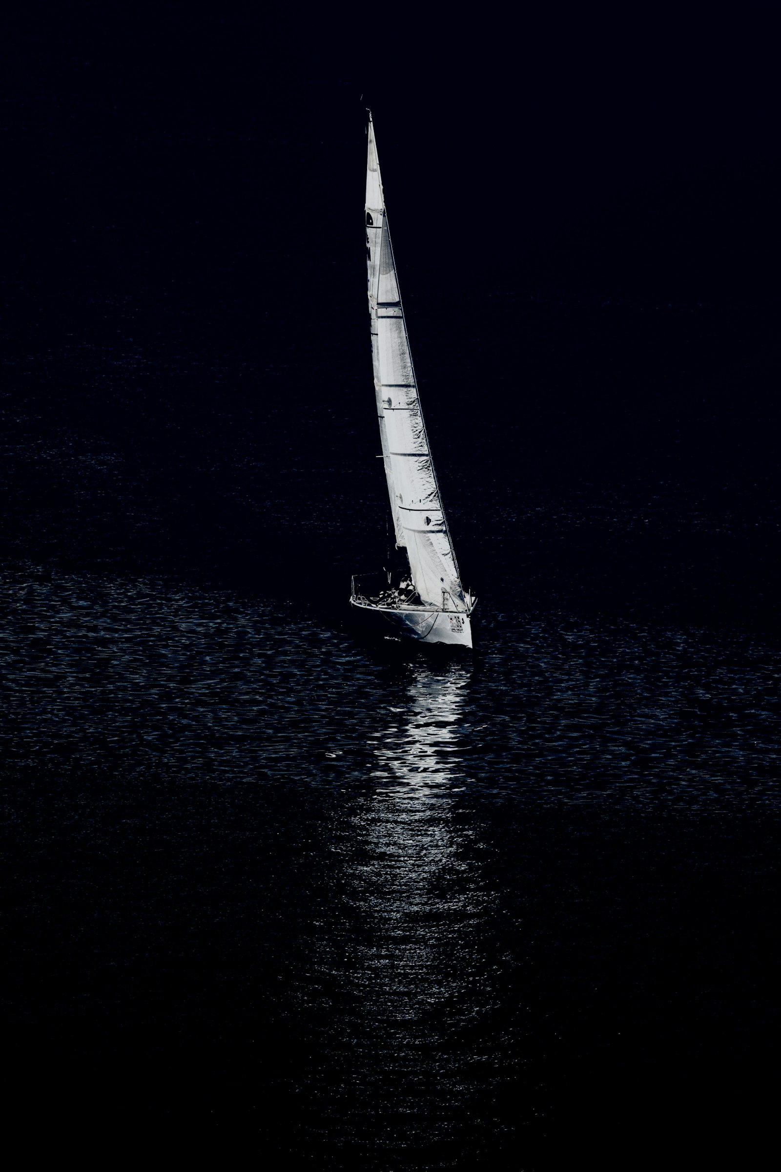 Canon EF 300mm F4L IS USM sample photo. White sailboat on body photography