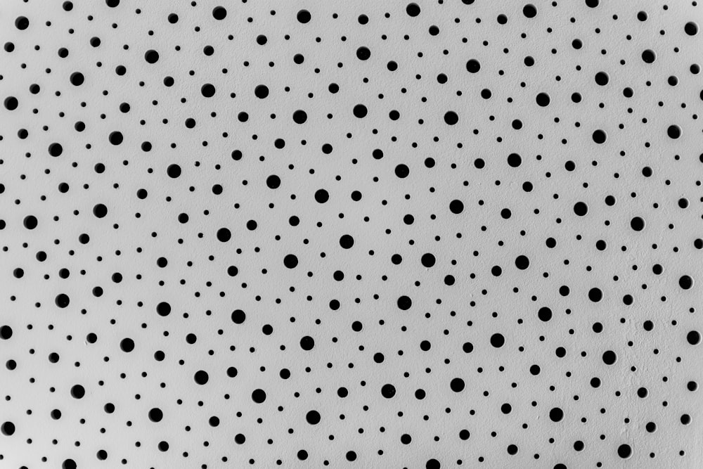 black and white polka dot textile