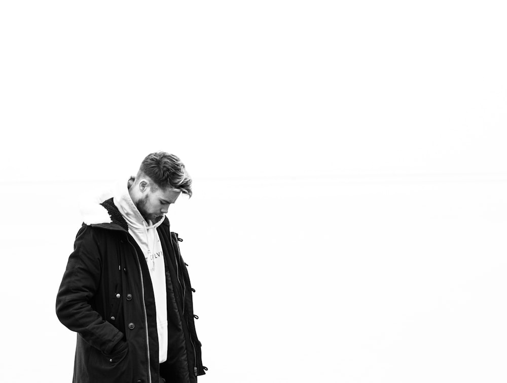 man wearing jacket on white background