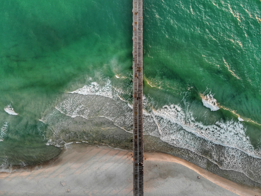 high angle photography of brown sea dock at day time