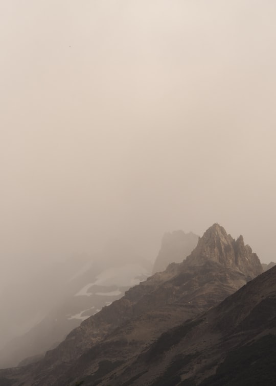 gray mountain covered by fog in El Chaltén Argentina