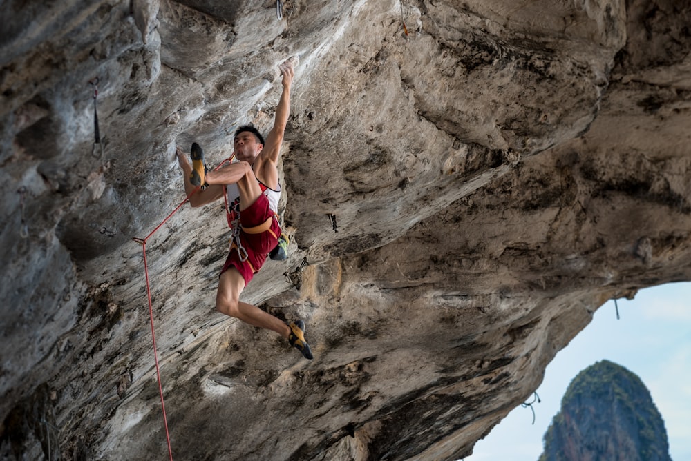 female doing cliff hanger