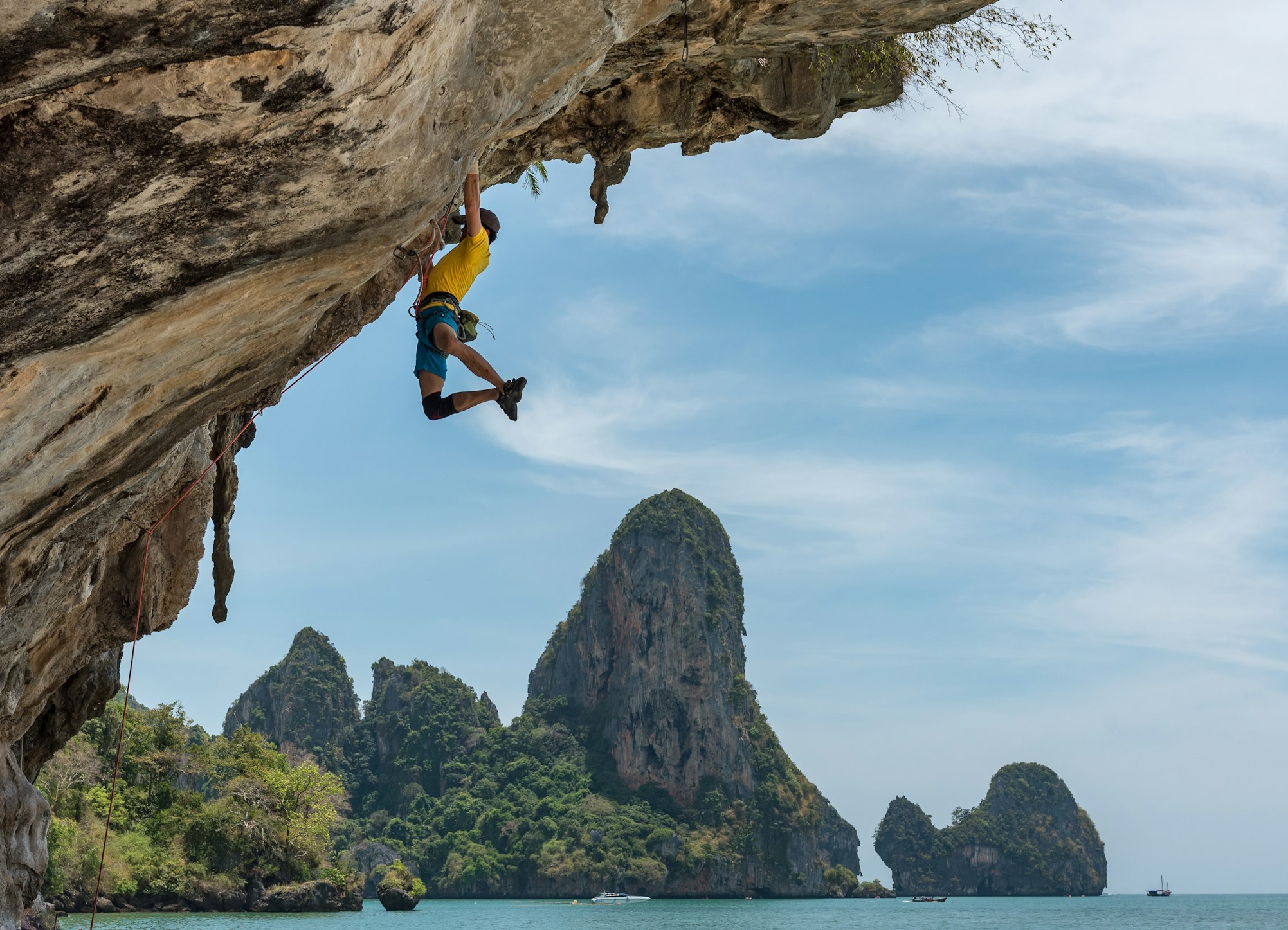 a man doing rock climbing