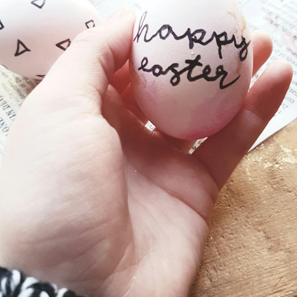 person holding Easter egg