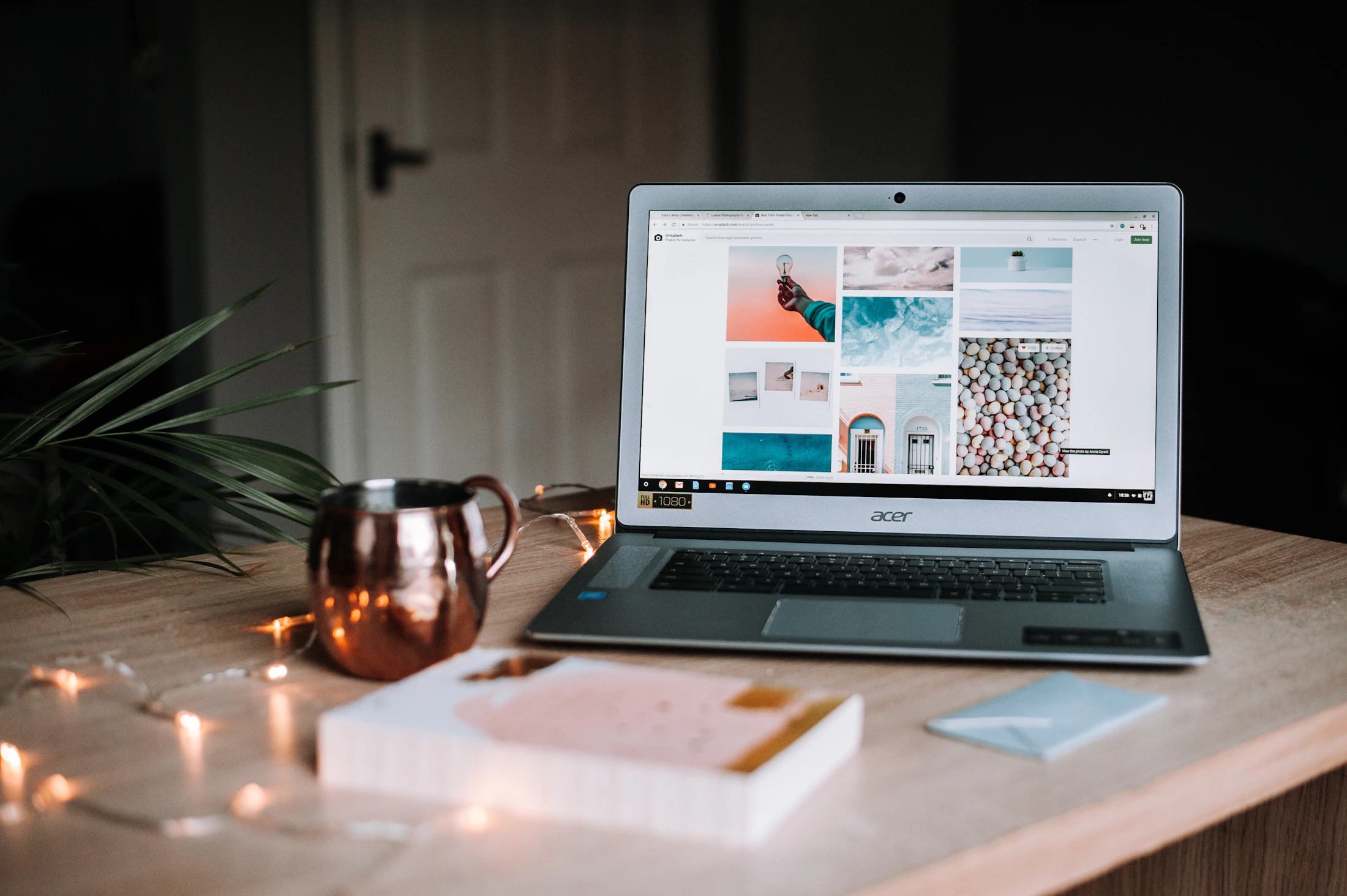 Planning a trip at a desk with notes, a passport and a laptop