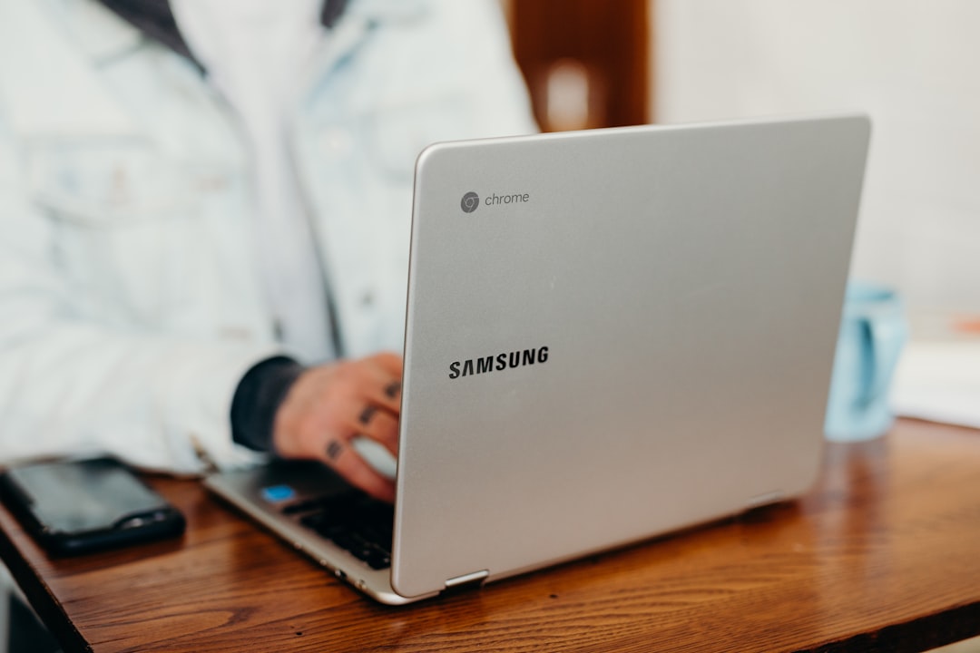shallow focus photography of person using gray Samsung laptop, Sponsored by Google Chromebooks