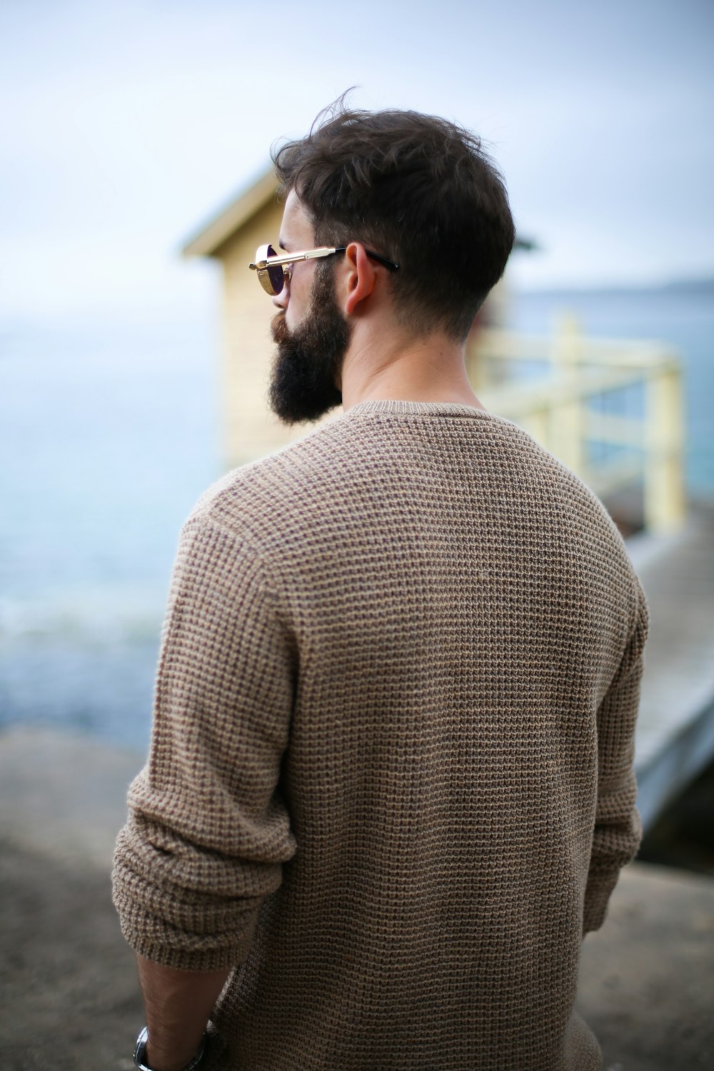 man standing on hill