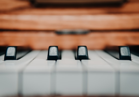 selective focus photography of piano keys
