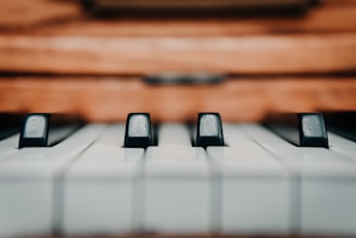 selective focus photography of piano keys
