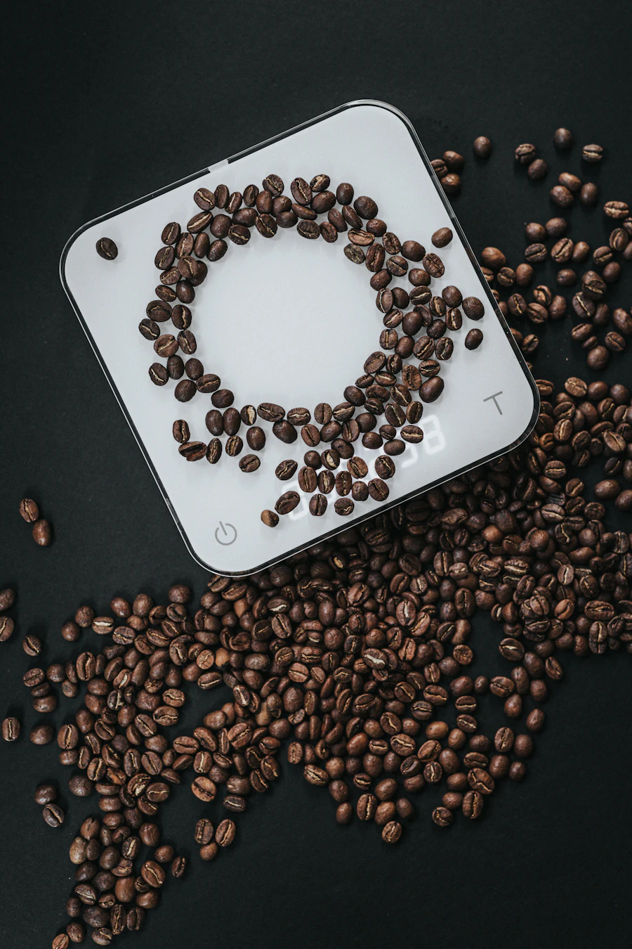 Roasted coffee beans measured on a digital scale