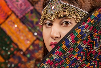 woman covered by multicolored scarf