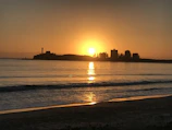 Sunset over the Atlantic Ocean viewed from Accra's coastline.