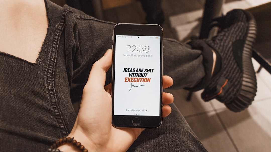 person holding iPhone, Ideas Are Shit Without Execution