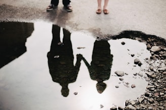 man and woman holding hand together