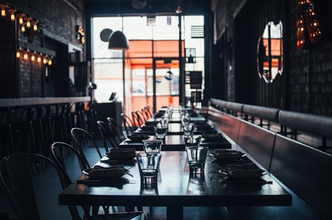 Diverse storefronts of businesses for sale in a bustling Arizona commercial area