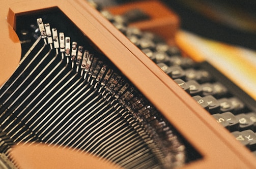 close-up photography of black and brown typewriter
