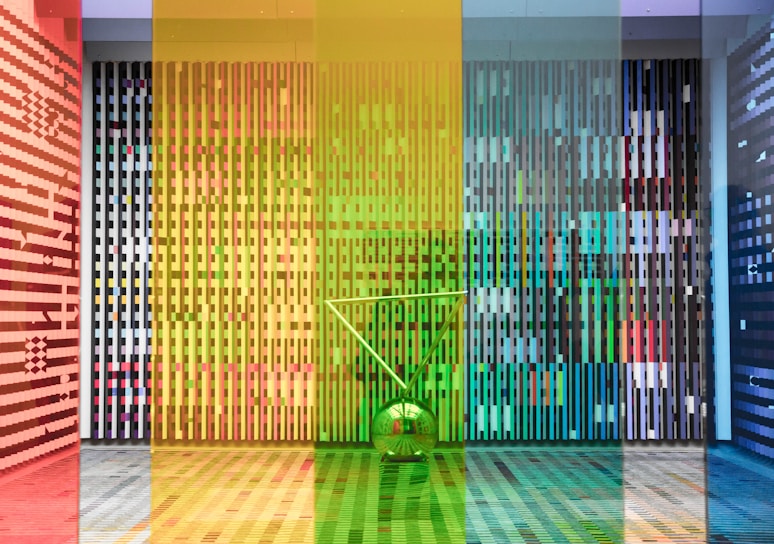 Abstract contemporary art installation with vibrant colors and dynamic shapes.