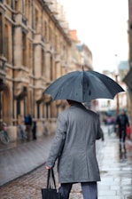man holding umbrella