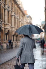 man holding umbrella