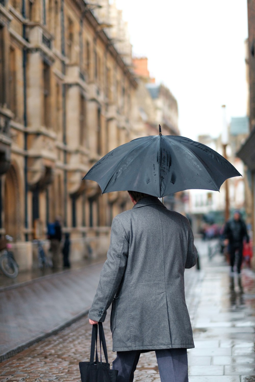 man holding umbrella