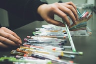 Assortment of colorful pens displayed in a clear organizer.