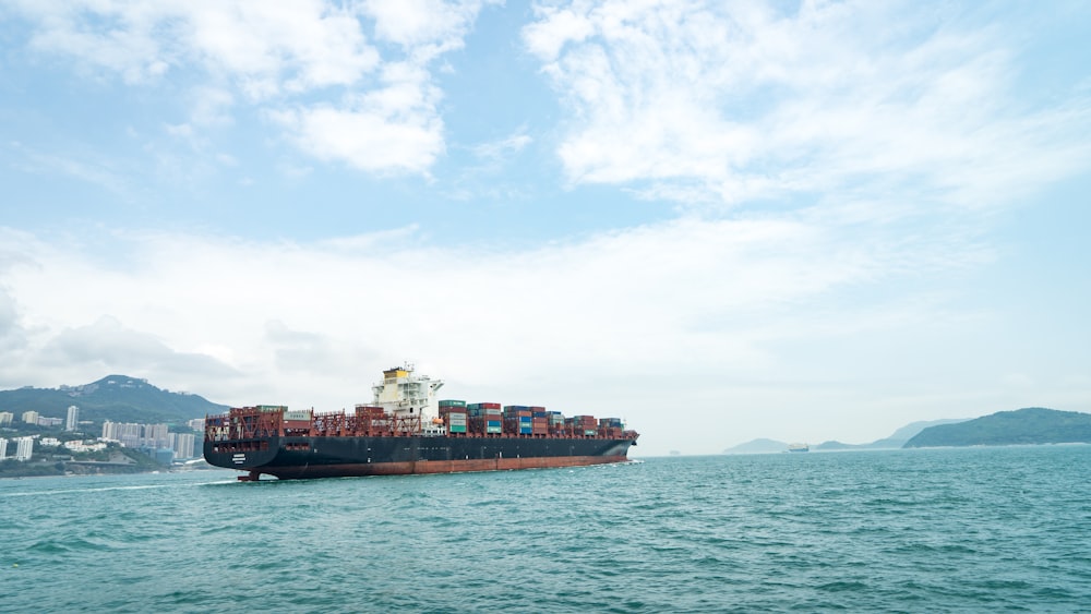 Photo by kinsey cargo vessel on body of water