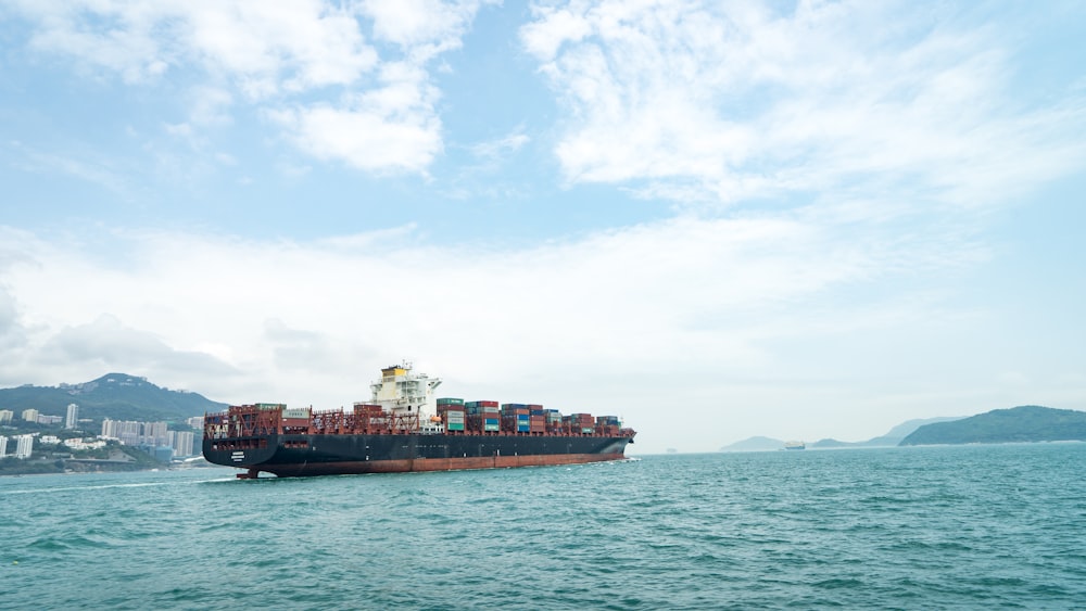 cargo vessel on body of water