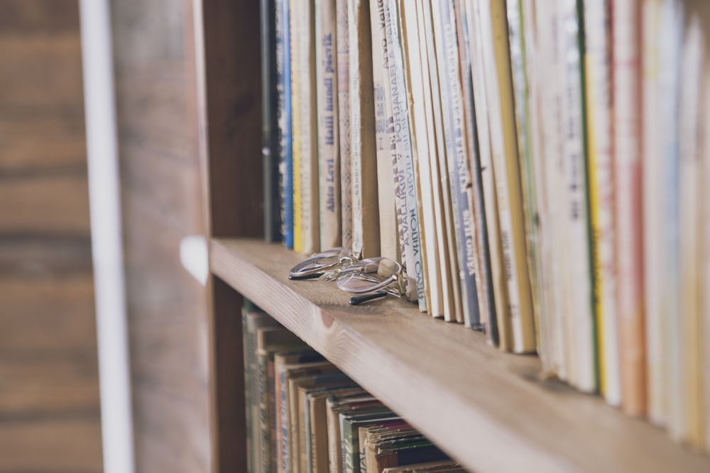 brown wooden book shelf