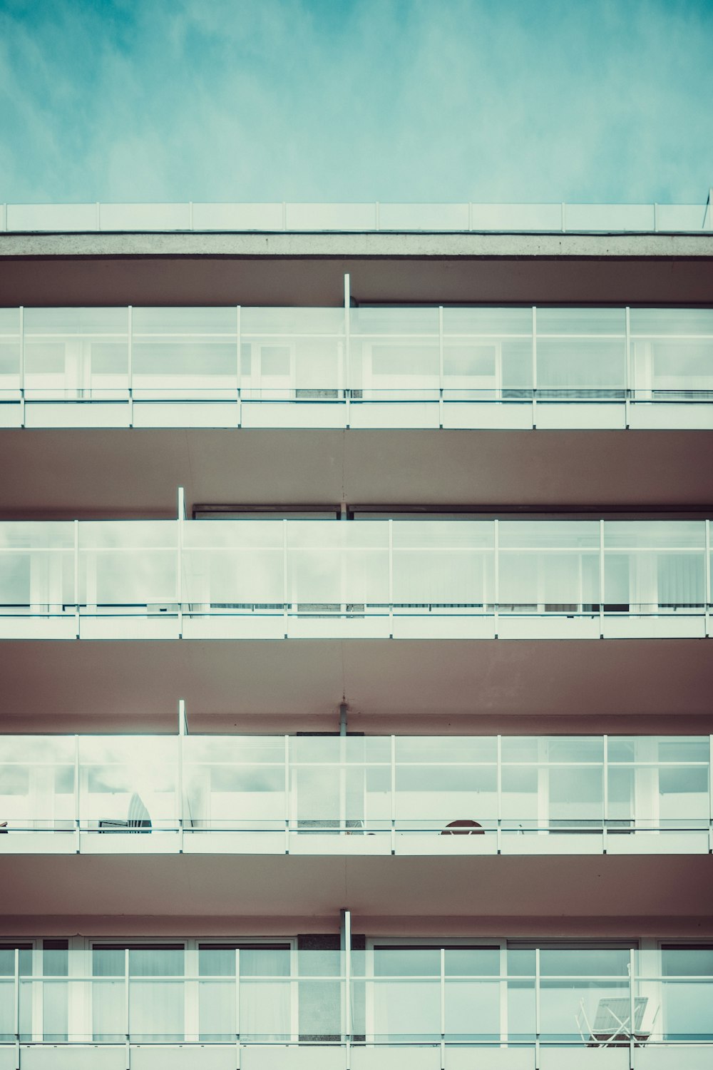 brown and white 4-storey building