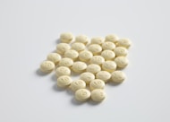 round yellow medication pill lot