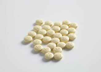 round yellow medication pill lot