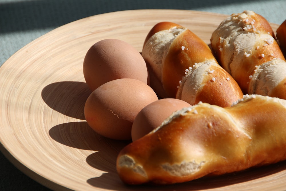 three organic eggs and three breads