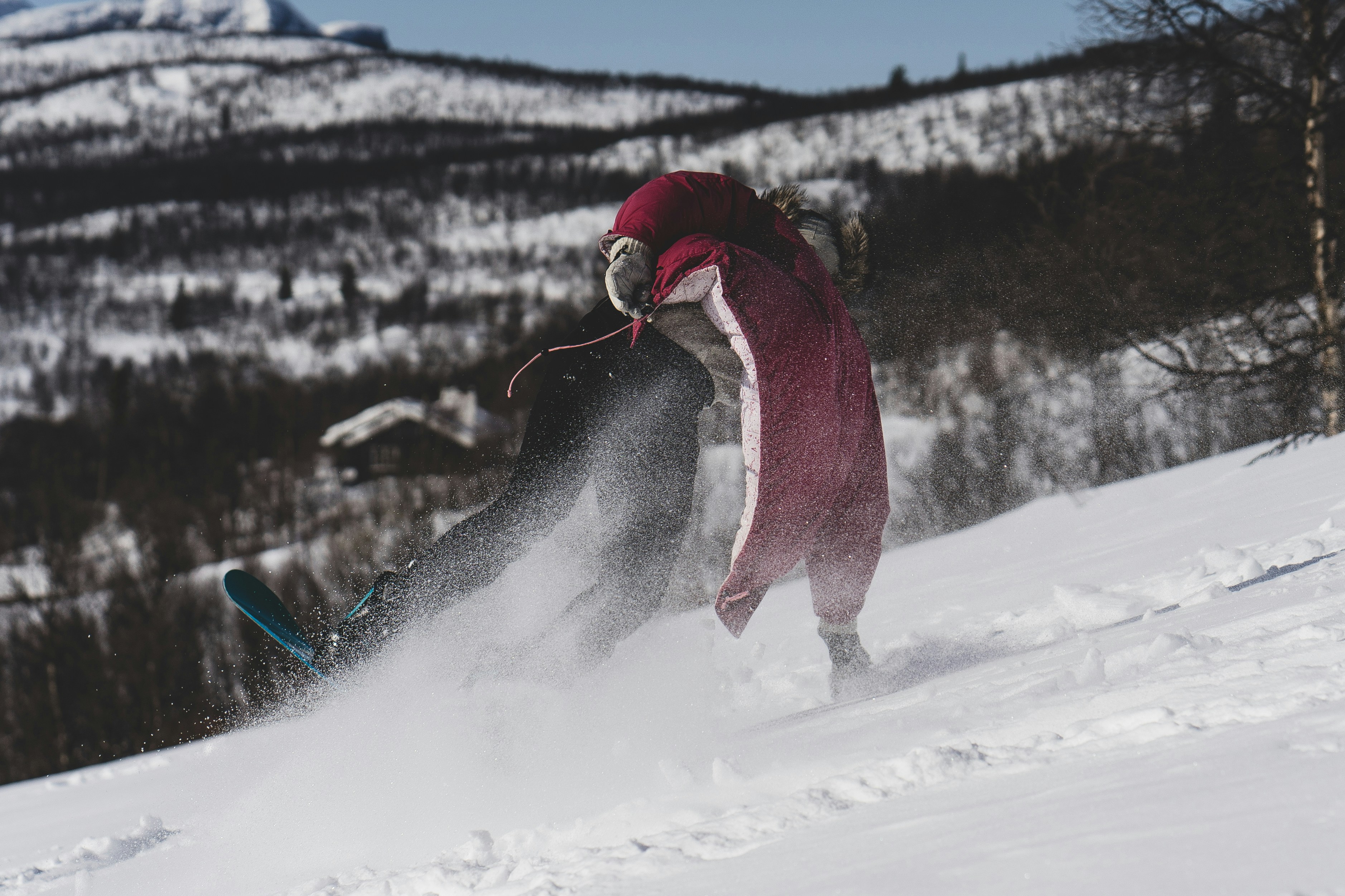pants and jacket on snow field