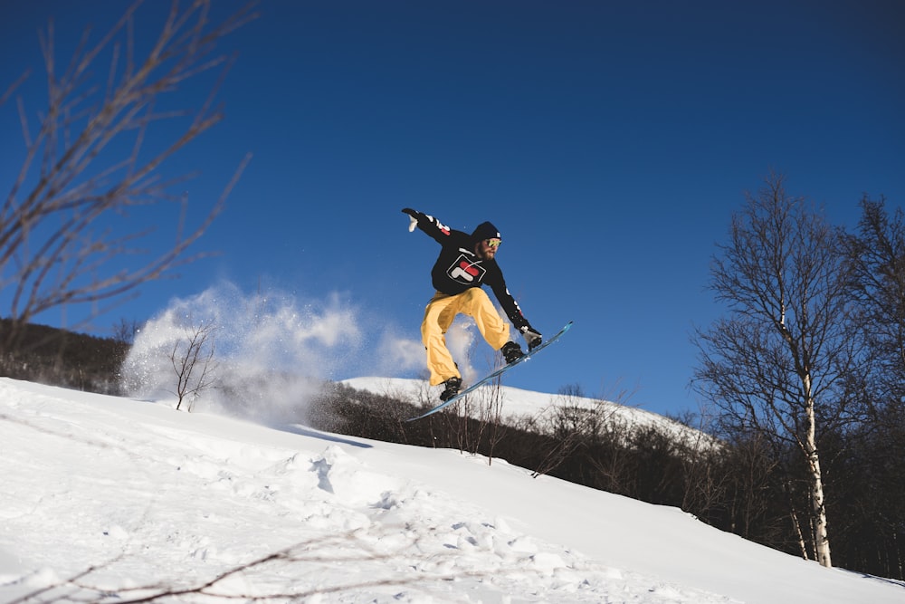 man standing on the snowboard