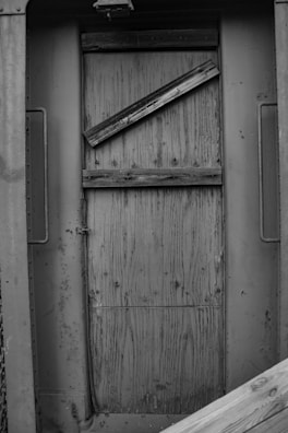 An old door frame reinforced and freshly painted in a residential home.