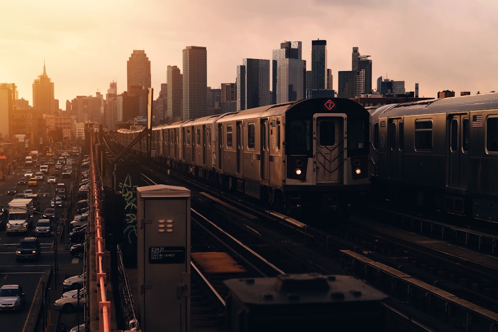 train approaching near high-rise buildings