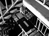 an offset image of a shadowed geometric staircase with sharp lines