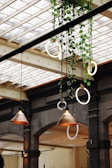brass and white pendant lamps